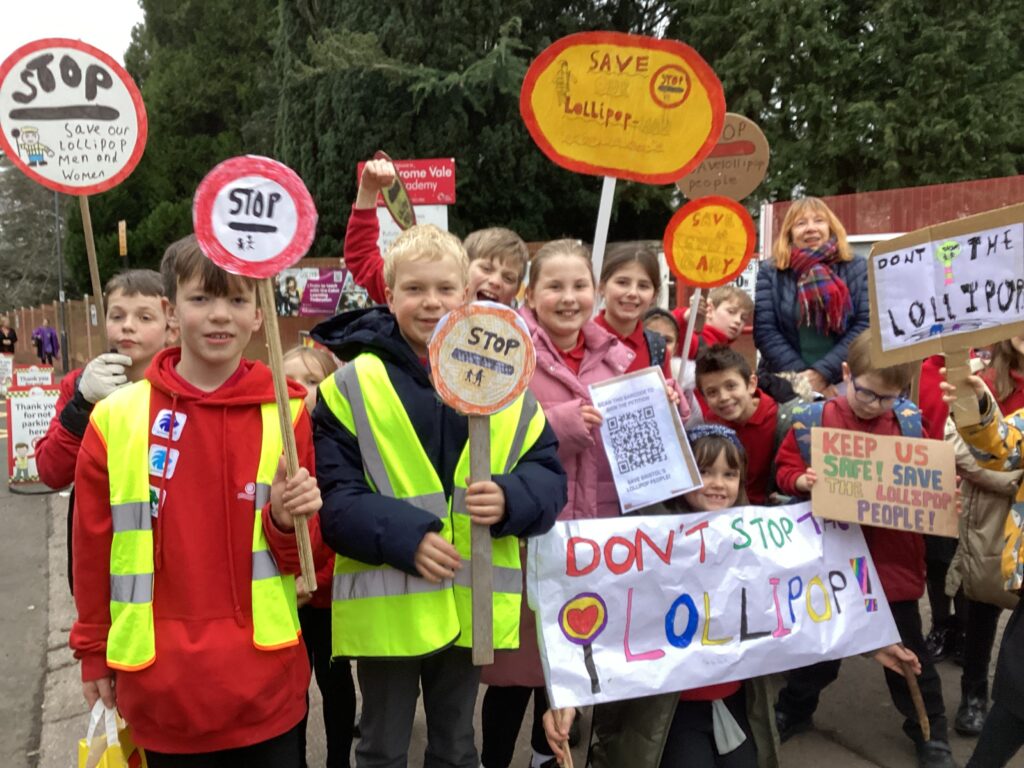 Pupils at Frome Vale Academy protest proposed cuts to lollipop staff